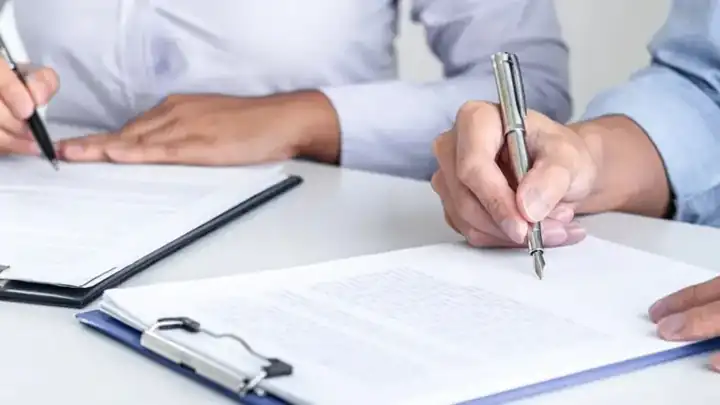Experts reviewing joint minutes